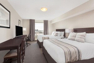 Room, 2 Queen Beds, Non Smoking | In-room safe, desk, laptop workspace, blackout drapes