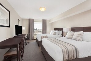 Room, 2 Queen Beds, Non Smoking | In-room safe, desk, laptop workspace, blackout curtains - Ramada by Wyndham Grassland (Grassland)