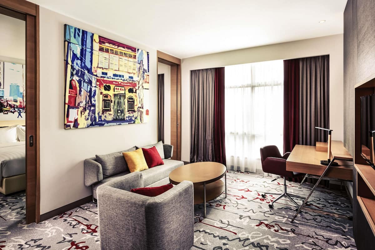 Suite, 1 Queen Bed | In-room safe, desk, iron/ironing board, free cribs/infant beds