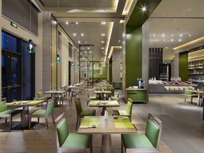 Lunch, dinner served; international cuisine, garden views 