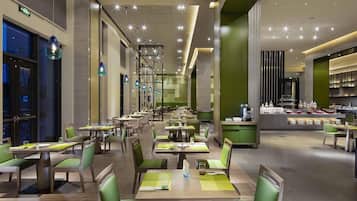 Lunch, dinner served; international cuisine, garden views