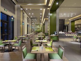 Lunch, dinner served; international cuisine, garden views