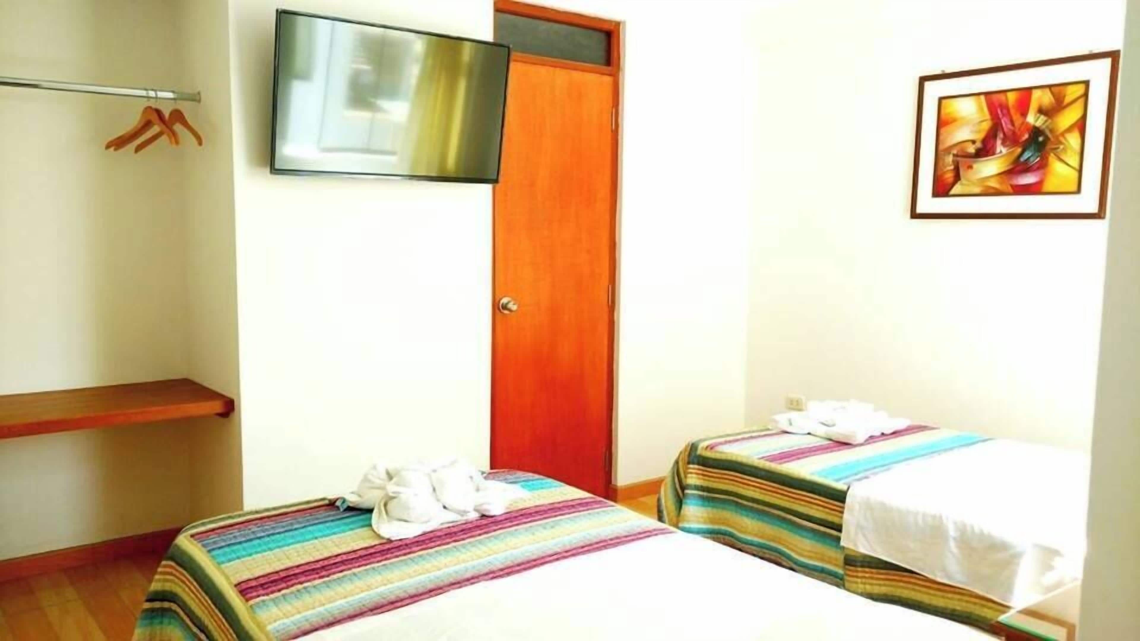 Standard Quadruple Room | Iron/ironing board, free WiFi