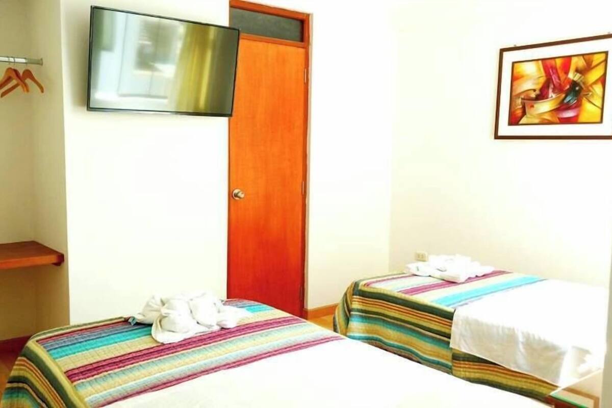 Standard Quadruple Room | Iron/ironing board, free WiFi