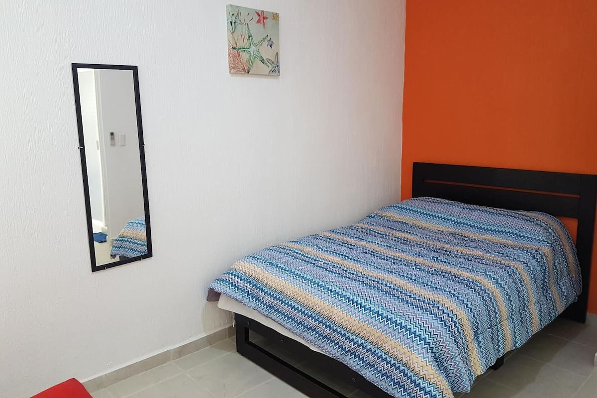 Down comforters, Tempur-Pedic beds, iron/ironing board, free WiFi