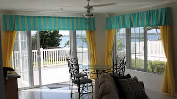 Deluxe Condo, 2 Bedrooms, Kitchen, Beach View | 2 bedrooms, premium bedding, in-room safe, iron/ironing board