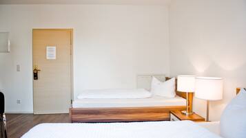 Businesshuoneisto, 1 makuuhuone | Ylelliset vuodevaatteet, työpöytä, ilmainen Wi-Fi, vuodevaatteet