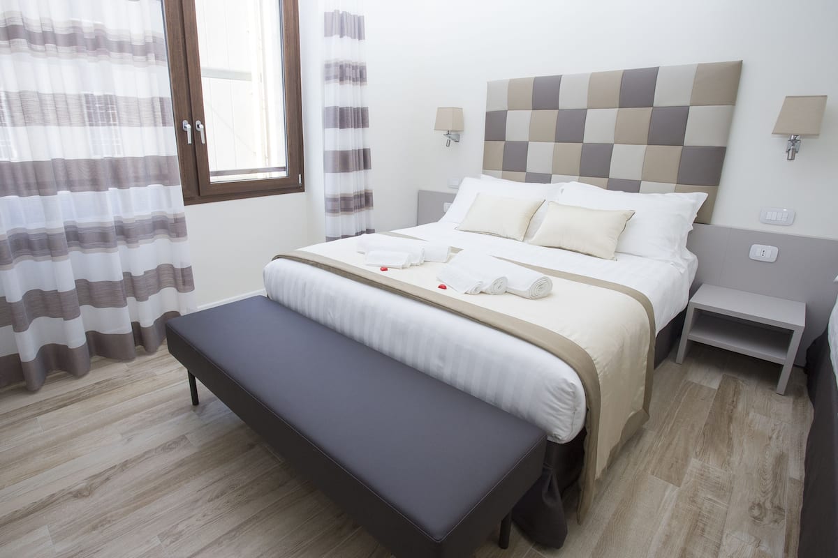 Premium Quadruple Room, Multiple Beds | Egyptian cotton sheets, premium bedding, pillow-top beds, minibar