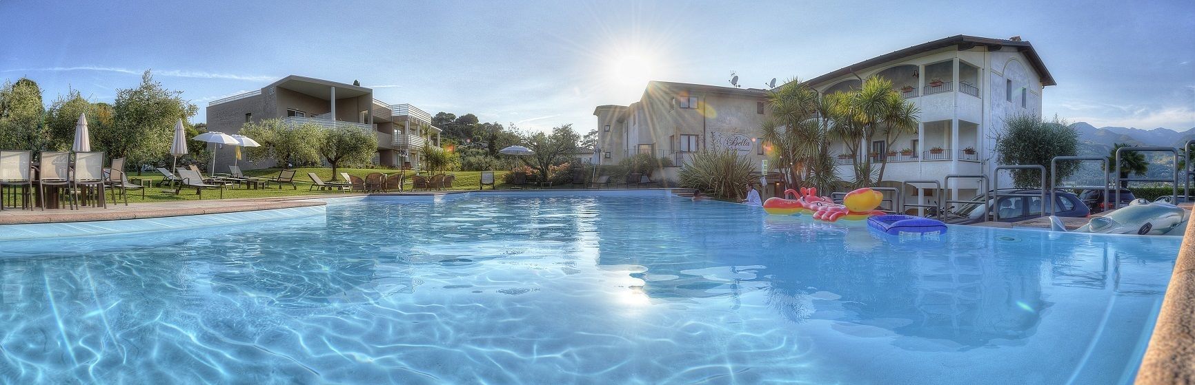 seasonal outdoor pool, pool umbrellas, pool loungers