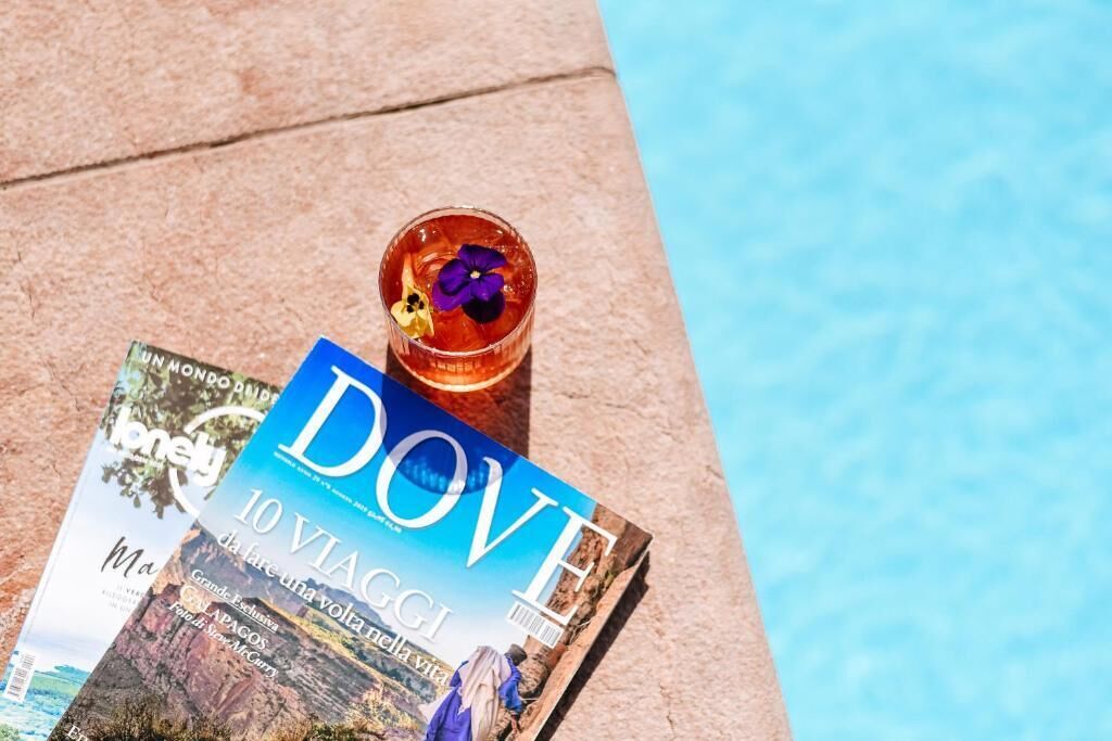 seasonal outdoor pool, pool umbrellas, pool loungers