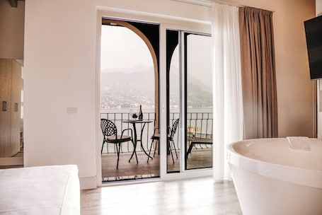 Suite, Balcony, Lake View | 1 bedroom, premium bedding, down comforters, minibar
