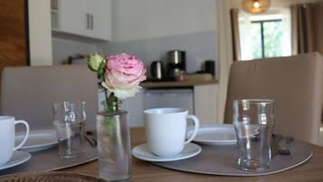 Habitación Confort doble, 1 cama doble, vistas al lago | Comedor