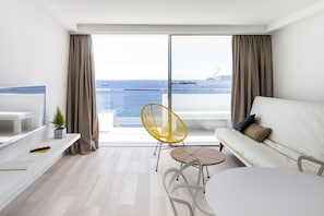 Suite, Terrace, Sea View | Living area | Flat-screen TV - Sud Ibiza Suites (Ibiza Town)