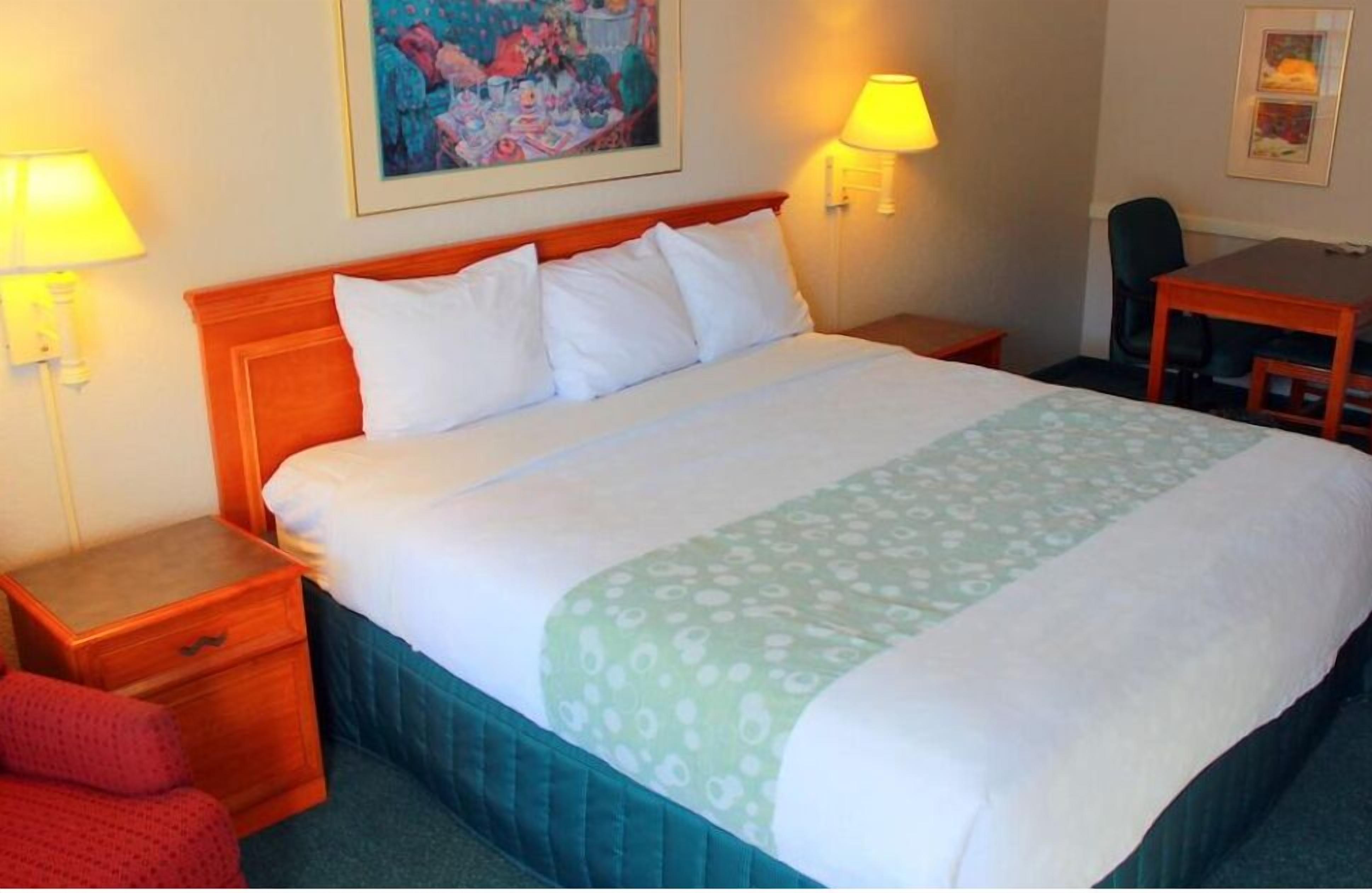 premium bedding, pillow-top beds, desk, iron/ironing board