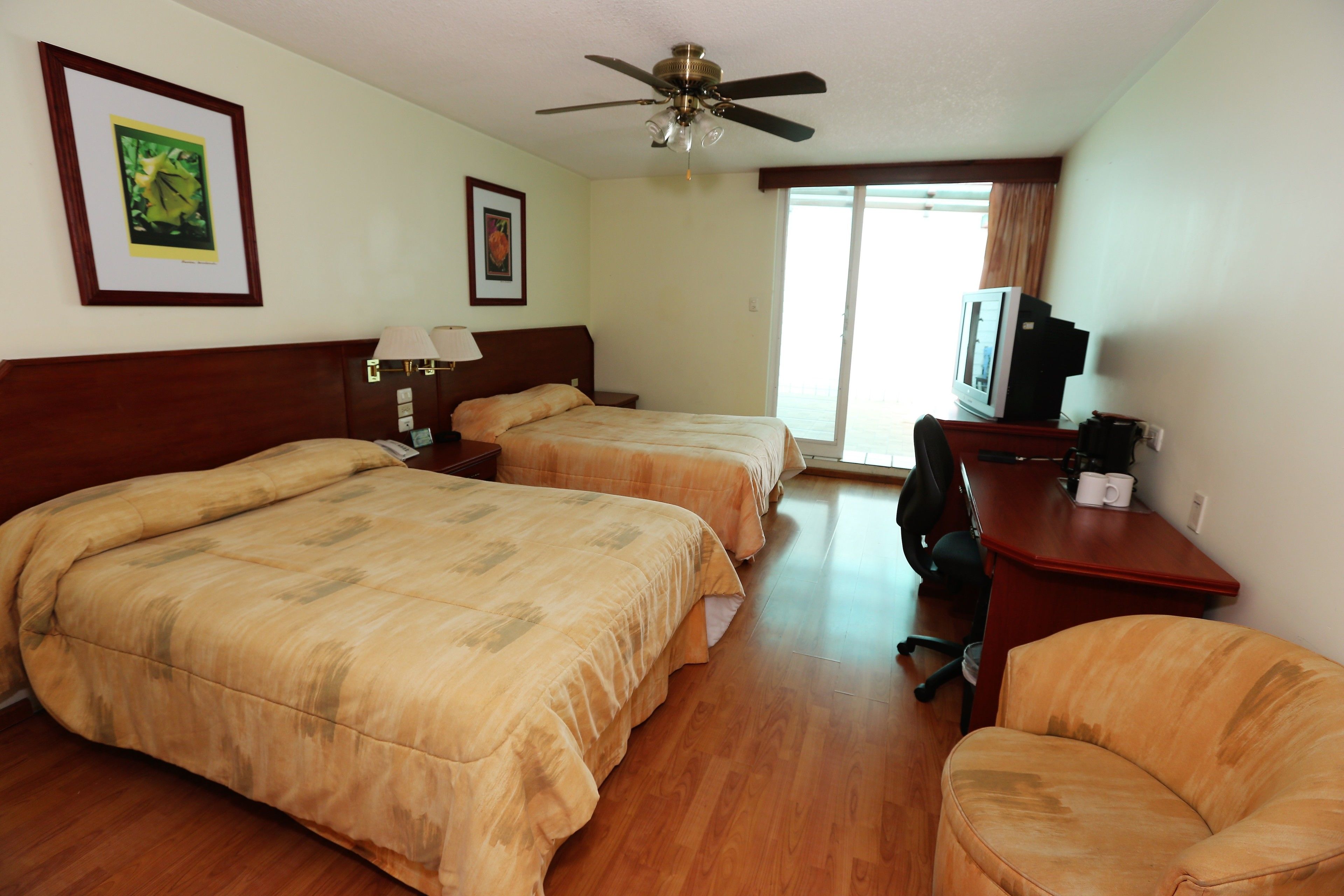 executive double room, 2 double beds | in-room safe, desk, soundproofing, iron/ironing board