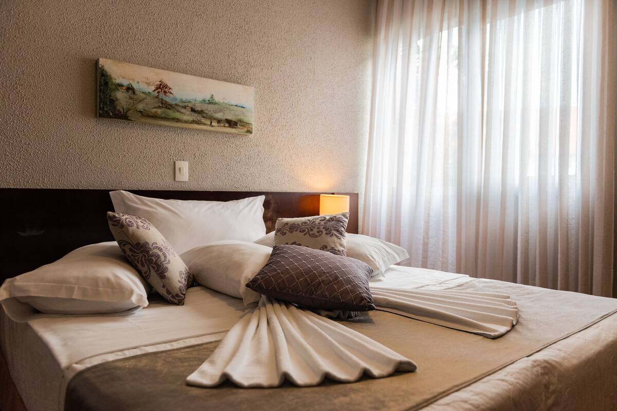 luxury suite | minibar, desk, laptop workspace, iron/ironing board