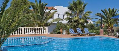 Seasonal outdoor pool, pool umbrellas, sun loungers