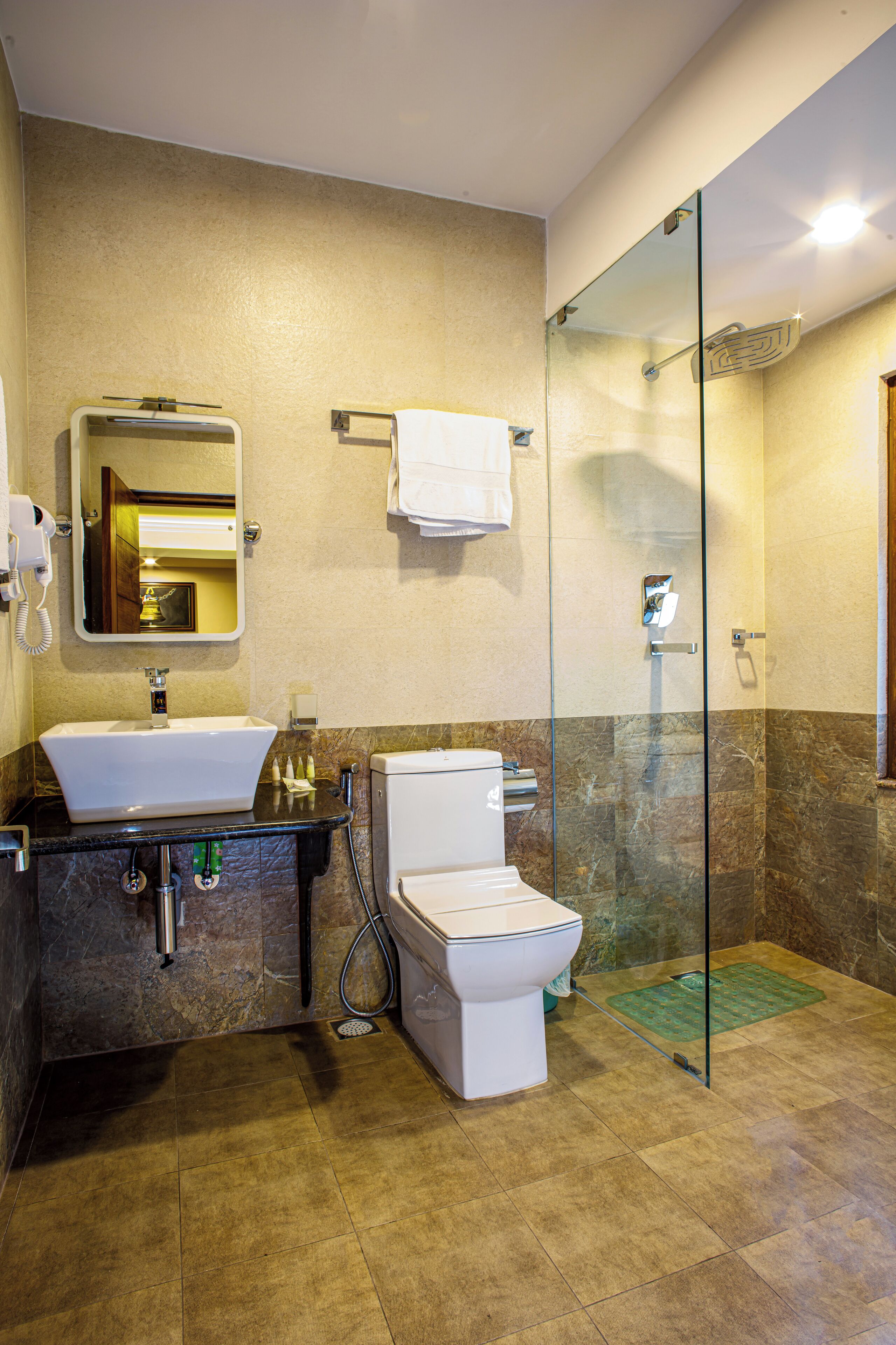 deluxe suite | bathroom | shower, free toiletries, hair dryer, bathrobes