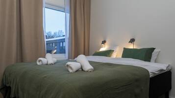 Twin Room, Private Bathroom (Hotel) | Individually furnished, blackout drapes, free WiFi, bed sheets