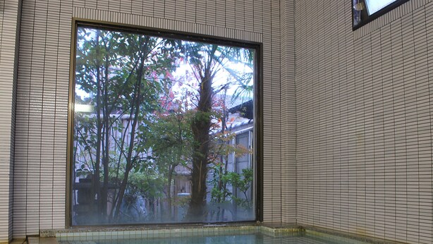 A swimming pool with tiled walls and a large window. - Hanagoyomi (Nanao)