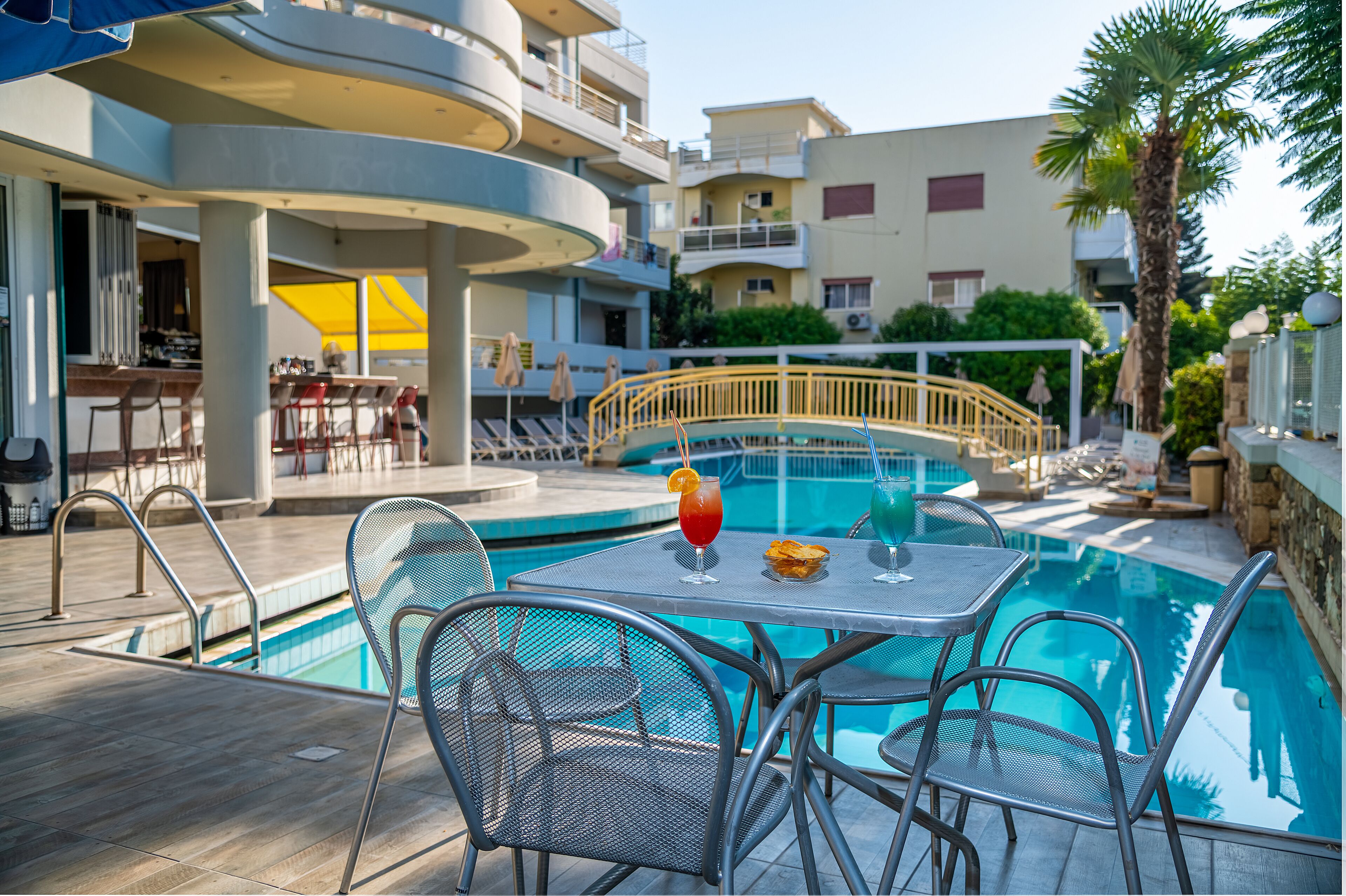 Seasonal outdoor pool, pool umbrellas, pool loungers