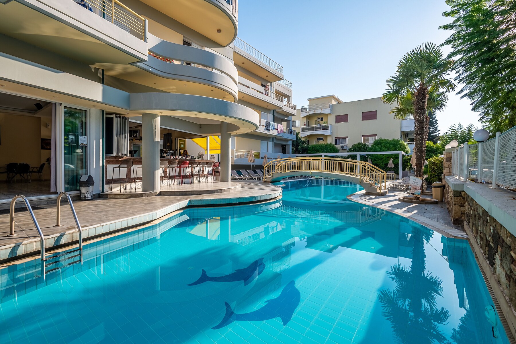 Seasonal outdoor pool, pool umbrellas, pool loungers