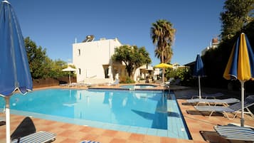 Outdoor pool, pool umbrellas, pool loungers