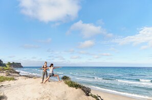 On the beach, sun-loungers, beach umbrellas, scuba diving