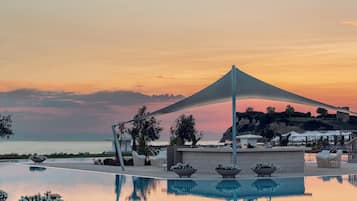 Indoor pool, outdoor pool, pool umbrellas, sun loungers