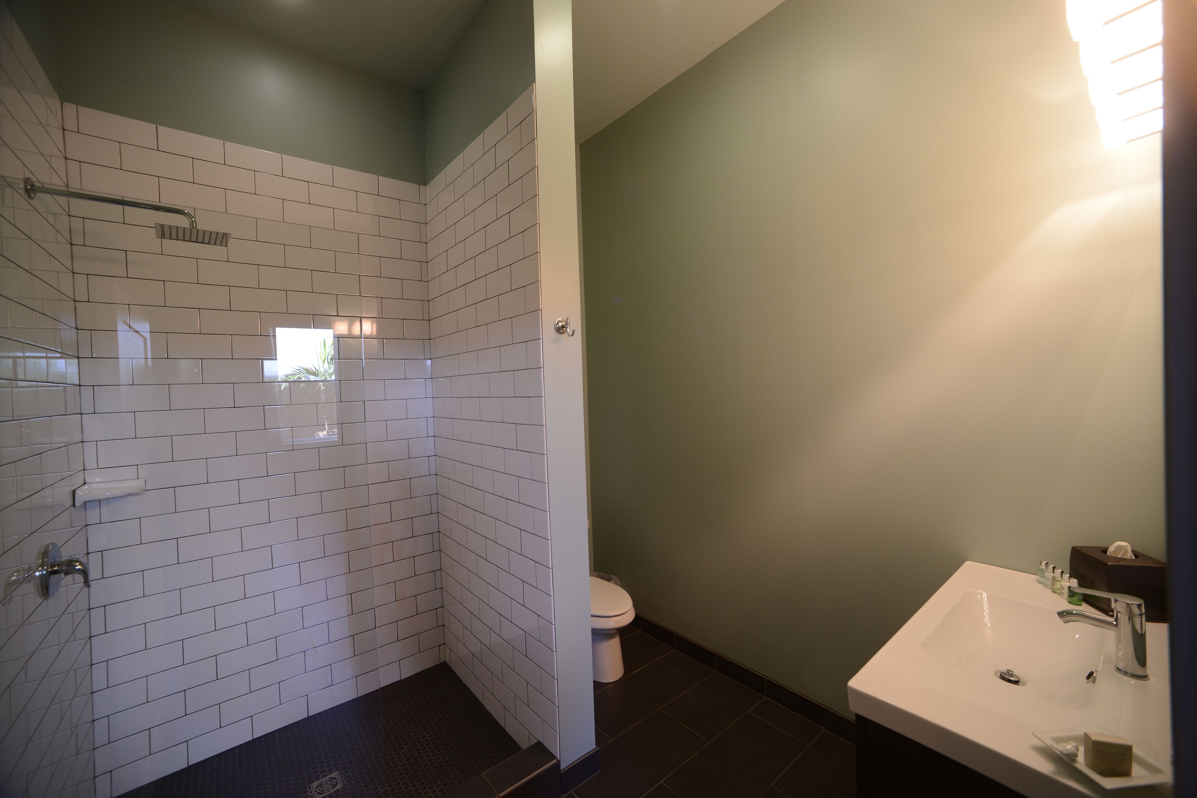 elite room, 1 king bed, city view | bathroom | shower, rainfall showerhead, designer toiletries, hair dryer