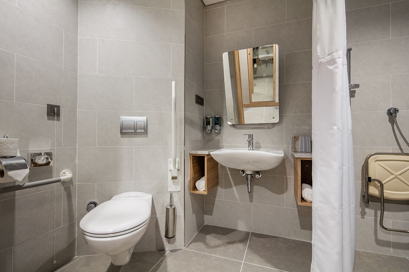 rainfall showerhead, hair dryer, slippers, towels