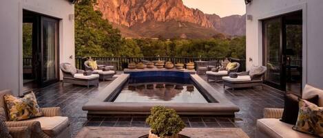 Outdoor pool, pool umbrellas, sun loungers
