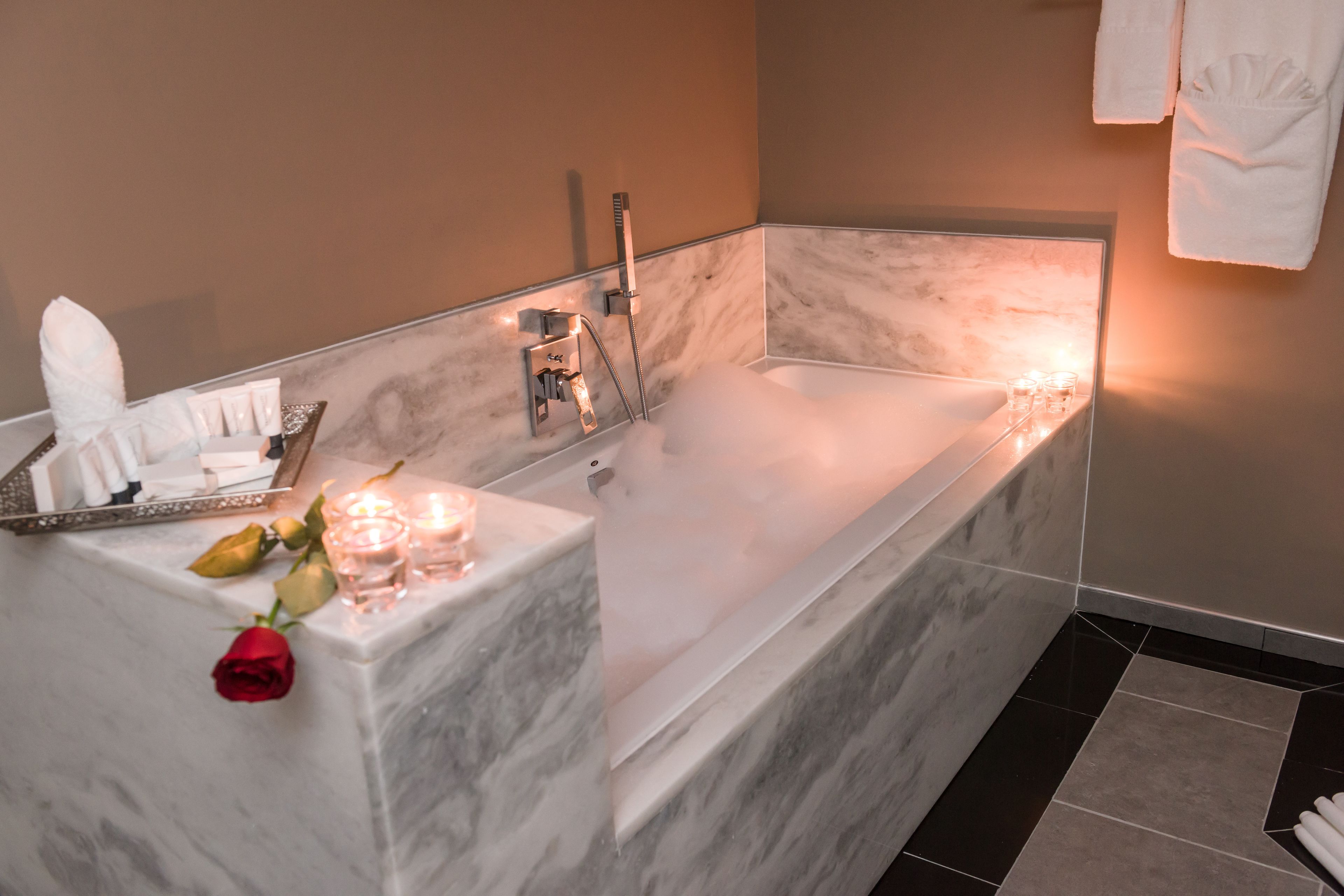 luxury suite | bathroom | free toiletries, bathrobes, slippers, towels