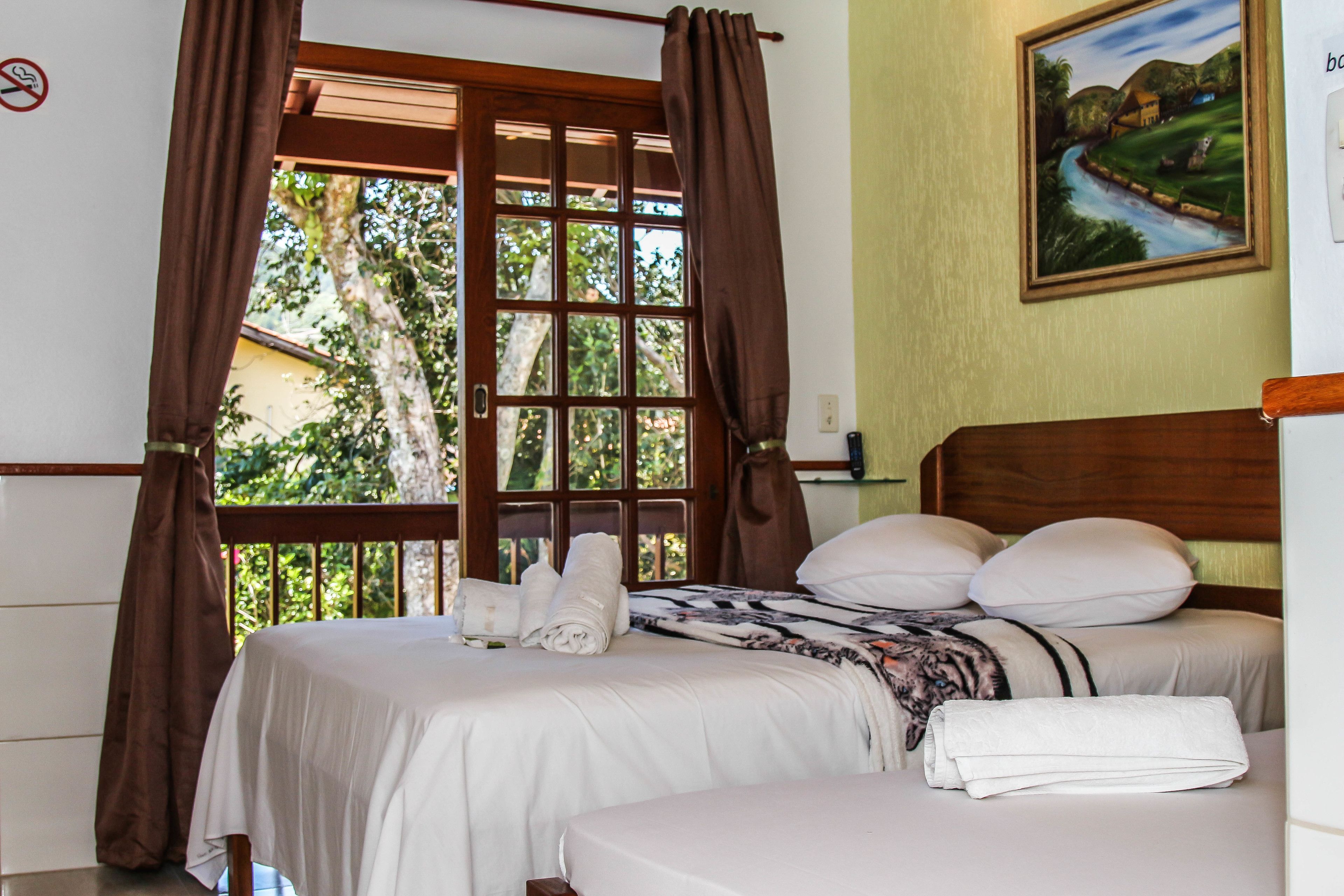 Apartamento | Frigobar, cofres nos quartos, escrivaninha, cortinas blackout