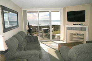 Apartment, 2 Bedrooms, Sea Facing | Living room | Flat-screen TV, fireplace, DVD player