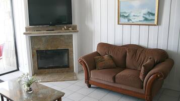Apartment, 2 Bedrooms, Sea Facing | Living room | TV, fireplace, DVD player