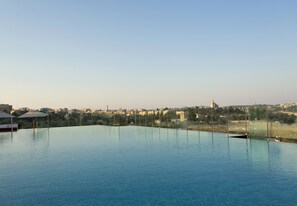 Indoor pool, seasonal outdoor pool, pool umbrellas