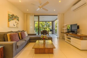 Deluxe 3 bedrooms | Living area - West Island by Horizon Holidays (Black River)