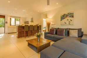 Deluxe 3 bedrooms | Living area | 42-cm TV with satellite channels - West Island by Horizon Holidays (Black River)
