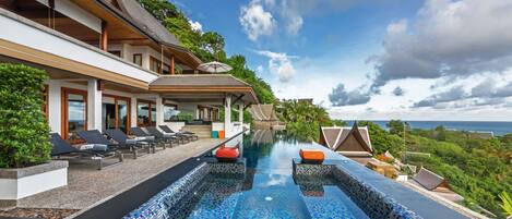 Outdoor pool, pool umbrellas, sun loungers