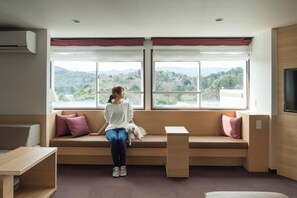 Deluxe Triple Room(Non-smoking) | 1 bedroom, bed sheets