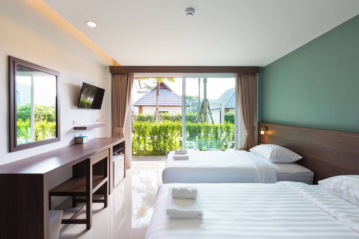 Habitación Deluxe con 1 cama matrimonial o 2 individuales | Vista al jardín