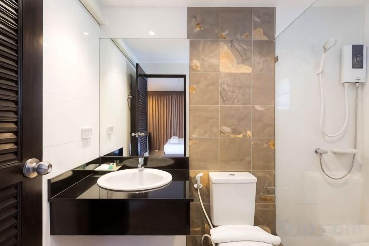 Baño | Ducha, artículos de higiene personal gratuitos y secador de pelo