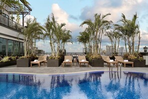 Outdoor pool, open 7:00 AM to 9:00 PM, pool umbrellas, pool loungers - Kravan Hotel (Phnom Penh)