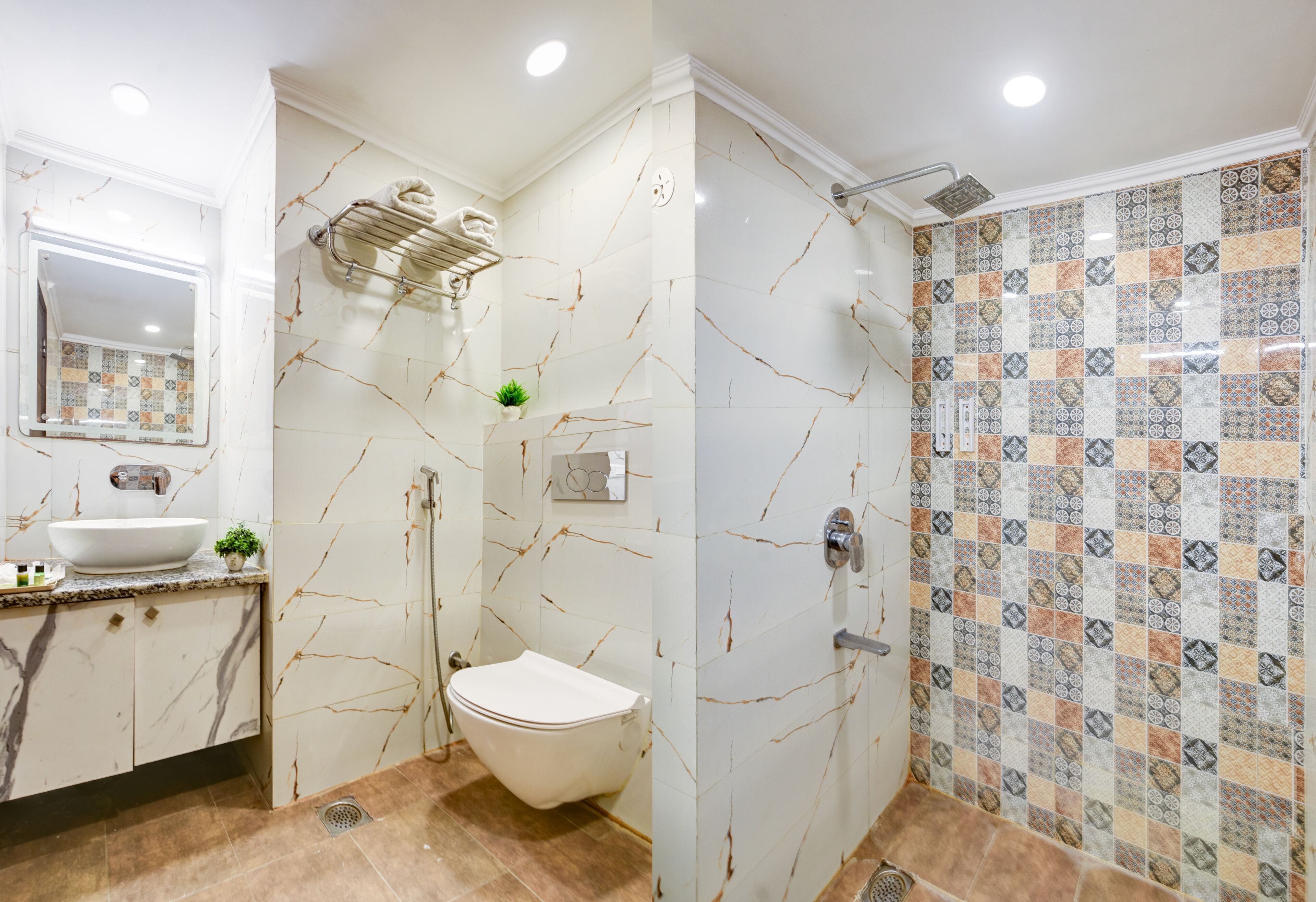 A bathroom with a white sink, a toilet, and a shower with patterned tiles.