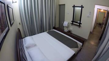 Bungalow, quang cảnh sân vườn | 1 phòng ngủ, bộ đồ giường cao cấp, bàn ủi/dụng cụ ủi quần áo