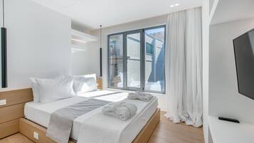 Departamento Deluxe, balcón | Caja de seguridad en la habitación, escritorio y insonorización