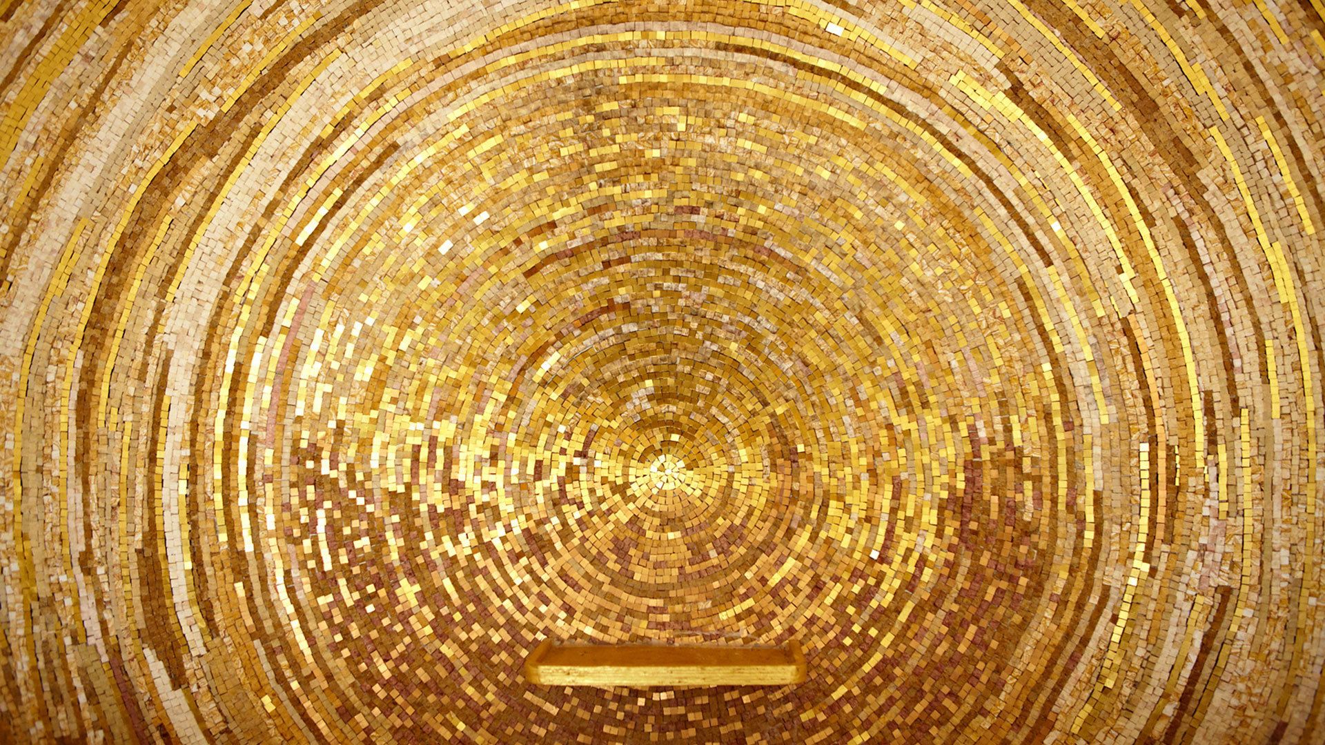 A circular mosaic pattern with concentric circles.