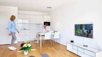 Full-sized fridge, stovetop, dishwasher, espresso maker