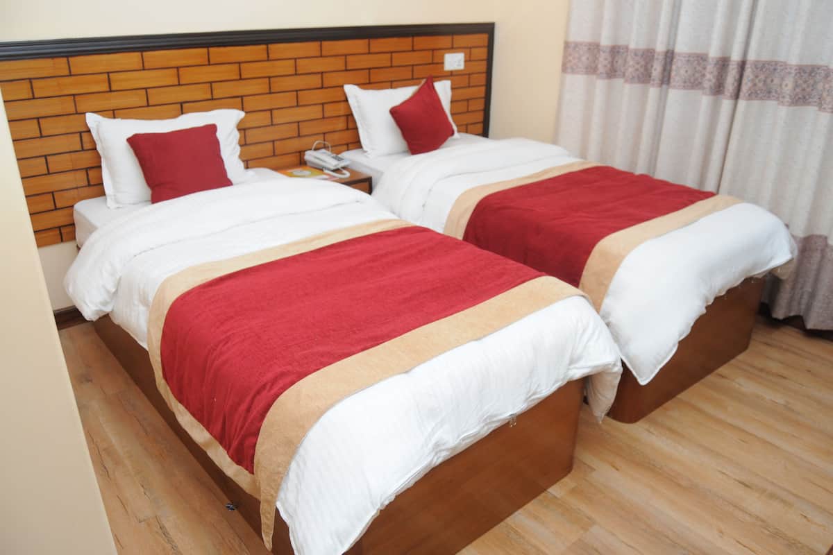Deluxe Twin Room, 2 Twin Beds | Premium bedding, memory foam beds, in-room safe, individually furnished
